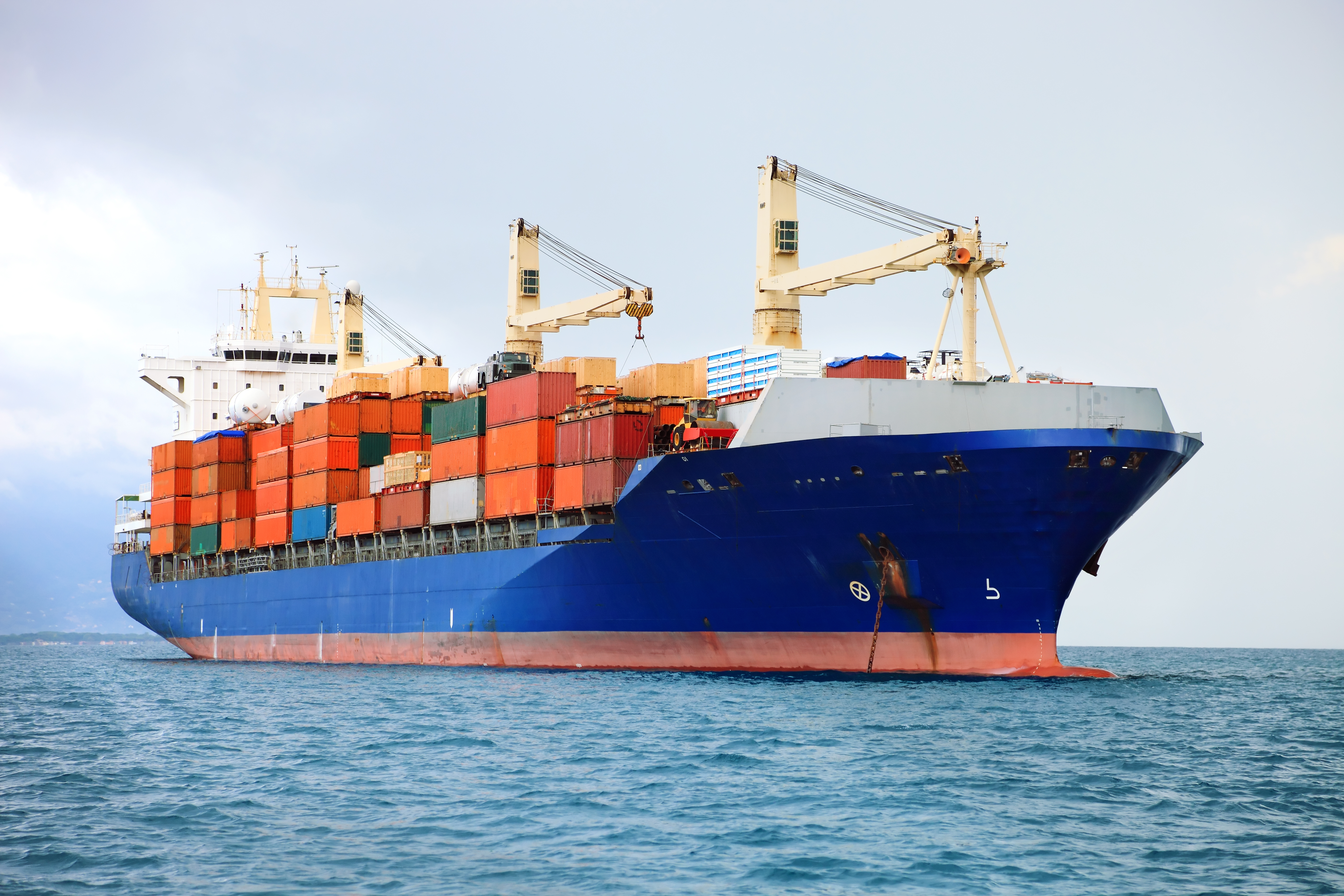 bigstock-Cargo-Container-Ship-32671073.j