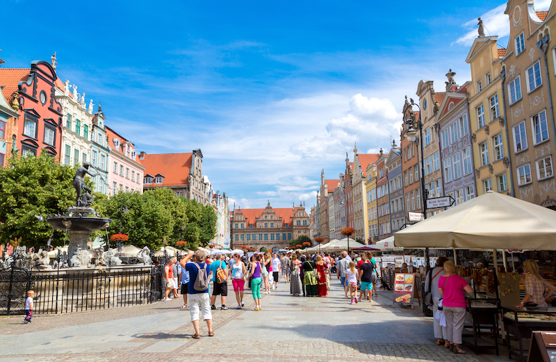 GDANSK POLAND - APRIL 01: People visitors Long Street on April 1 2014 in Gdansk Poland. Street is one of the most notable tourist attractions of the city.