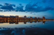Night city reflection on the river in Donetsk. Ukraine