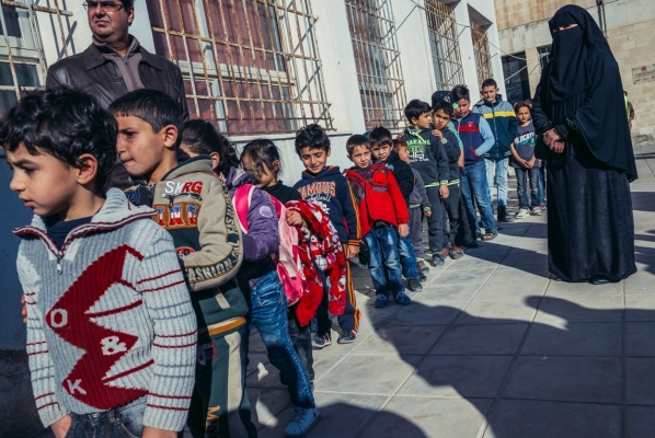 Ar Ramtha Jordan - December 23 2015. Students and teachers of primary school for Jordanians and Syrian refugees in Ar Ramtha city