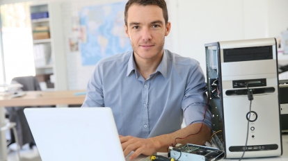 Engineer proceeding to data recovery from computer