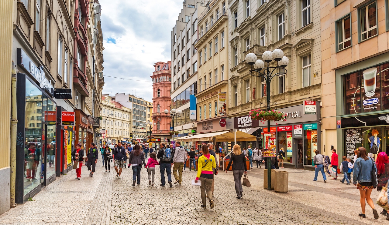 PRAGUE, CZECH REPUBLIC - 21 JUNE 2014: People on the streets of Prague, Czech Republic. Prague is one of the most visited city in Europe with over 5 million visitors every year.