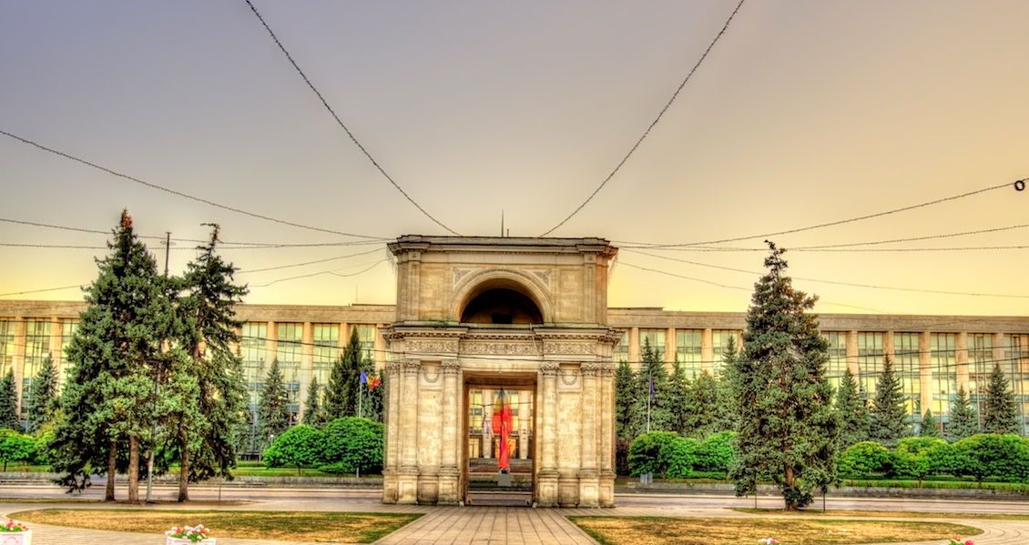 The Triumphal Arch And The Government Building In Chisinau – Moldova