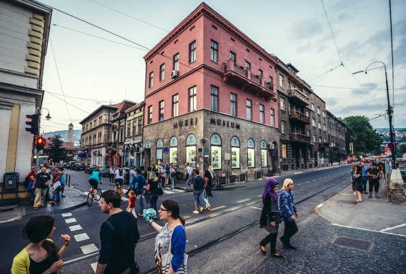 Sarajevo Bosnia and Herzegovina - August 23 2015. People walks in front of place of Assassination of Archduke Franz Ferdinand of Austria