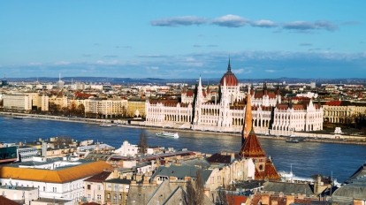 Budapest, Hungary. Aerial view of the old city Budapest, Hungary with river and Parliament Building with cloudy blue sky