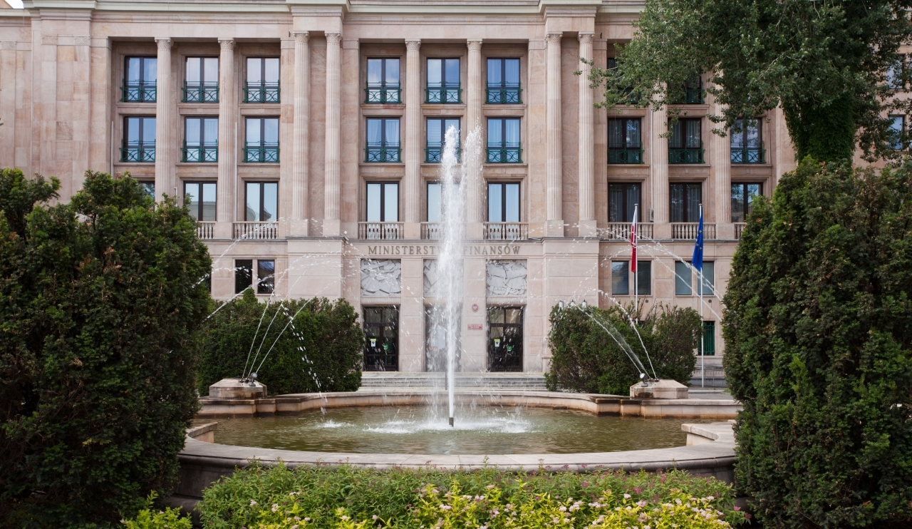 Front of finance ministry in Warsaw Poland with a fountain framing the entrance. Could be used for images about Euro currency problems