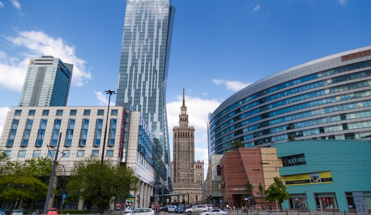 WARSAW, POLAND - MAY 07, 2016: Building Palace of Culture and Science among the modern buildings of the city