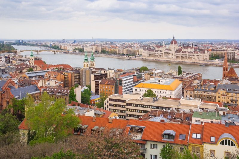 Budapest scene of downtown with Hungarian Parliament and Danube river. Budapest is the capital of European country Hungary and very popular travel destination for romantic trip.