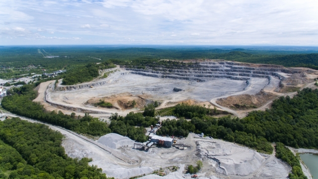 Aerial view over the building materials processing factory. View from above.