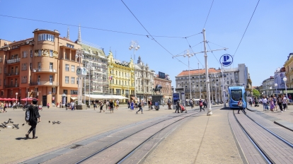ZAGREB, CROATIA - JULY 17, 2017: Square Ban Josip Jelacic with tourists and trams on a summer day in Zagreb. City of Zagreb is the capital of Croatia.