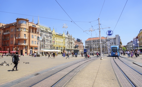 ZAGREB, CROATIA - JULY 17, 2017: Square Ban Josip Jelacic with tourists and trams on a summer day in Zagreb. City of Zagreb is the capital of Croatia.