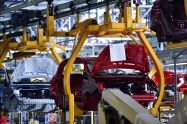 Car bodies on the production line inside automobile factory