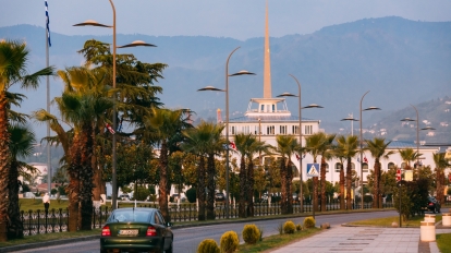 Batumi, Adjara, Georgia - May 27, 2016: Batumi, Adjara, Georgia. Gogebashvili Street Road And Marine Station Or Maritime Station Building Batumi On Background