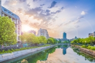 Dambovita river and center of Bucharest at sunset time Romania.