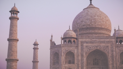 Amazing view on the Taj Mahal in sunset light with reflection in water. The Taj Mahal is an ivory-white marble mausoleum on the south bank of the Yamuna river. Agra Uttar Pradesh India.