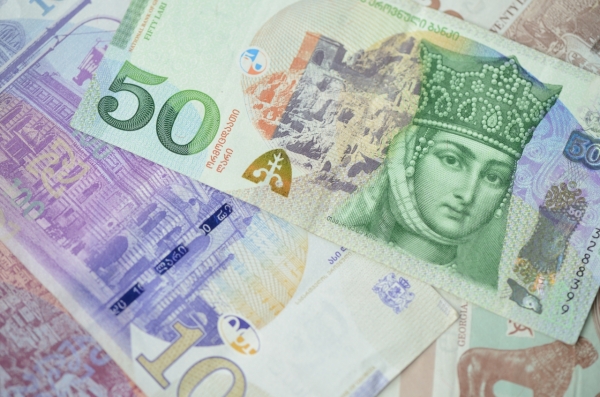 Background of Georgian Lari banknotes close up