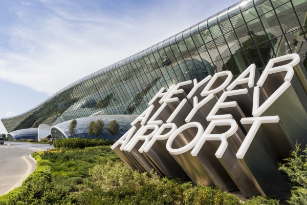 Azerbaijan Baku - September 16 2015: View of the Heydar Aliyev International Airport sign in Baku Azerbaijan. The airport is the home of Azerbaijan Airlines the national flag carrier.