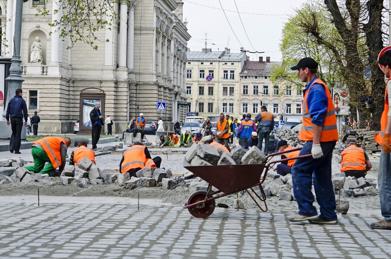Workers Laid Paving Stones