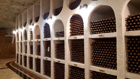 CRICOVA MOLDOVA July 24 2017 :Underground wine cellar with collection of bottles in niches. Winery with 120 km of underground passages for wine storage