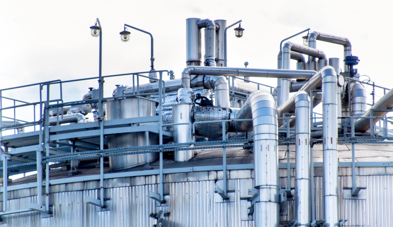 Industrial concept. Liquid gas container. Gas storage in the port. Pipelines in the refinery