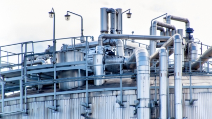 Industrial concept. Liquid gas container. Gas storage in the port. Pipelines in the refinery