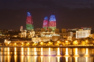 BAKU AZERBAIJAN - SEPTEMBER 15 2016: Baku Flame Towers at night. It is the tallest skyscraper in Baku Azerbaijan with a height of 190 meters.