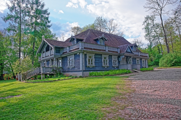 Old wooden house in Bialowieza National Park as a part of Belovezhskaya Pushcha National Park in Poland.
