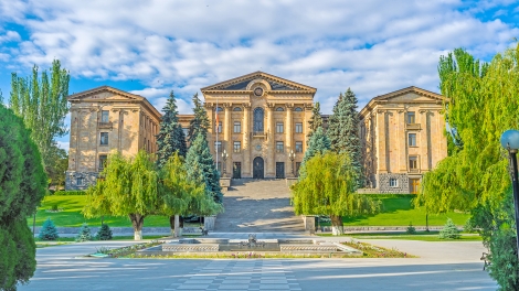 The light orange tuff building of Armenian Parliament located on the hill in Kond District Yerevan Armenia.