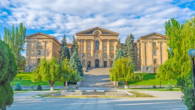 The light orange tuff building of Armenian Parliament located on the hill in Kond District Yerevan Armenia.
