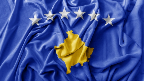 Ruffled waving Kosovo flag national flag close