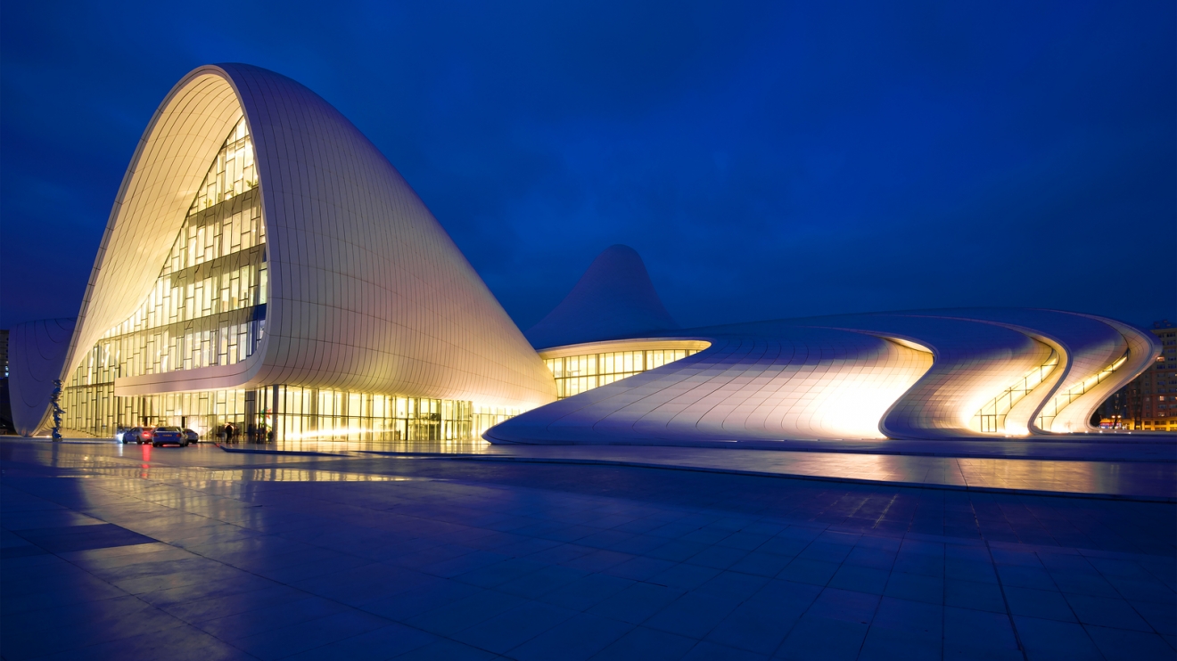 BAKU, AZERBAIJAN - JANUARY 05, 2018: The building of Heydar Aliyev's center in the night illumination on December evening
