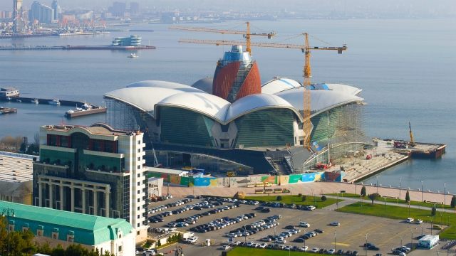 BAKU, AZERBAIJAN - DECEMBER 29, 2017: Construction of a new shopping center on the embankment of Baku Bay