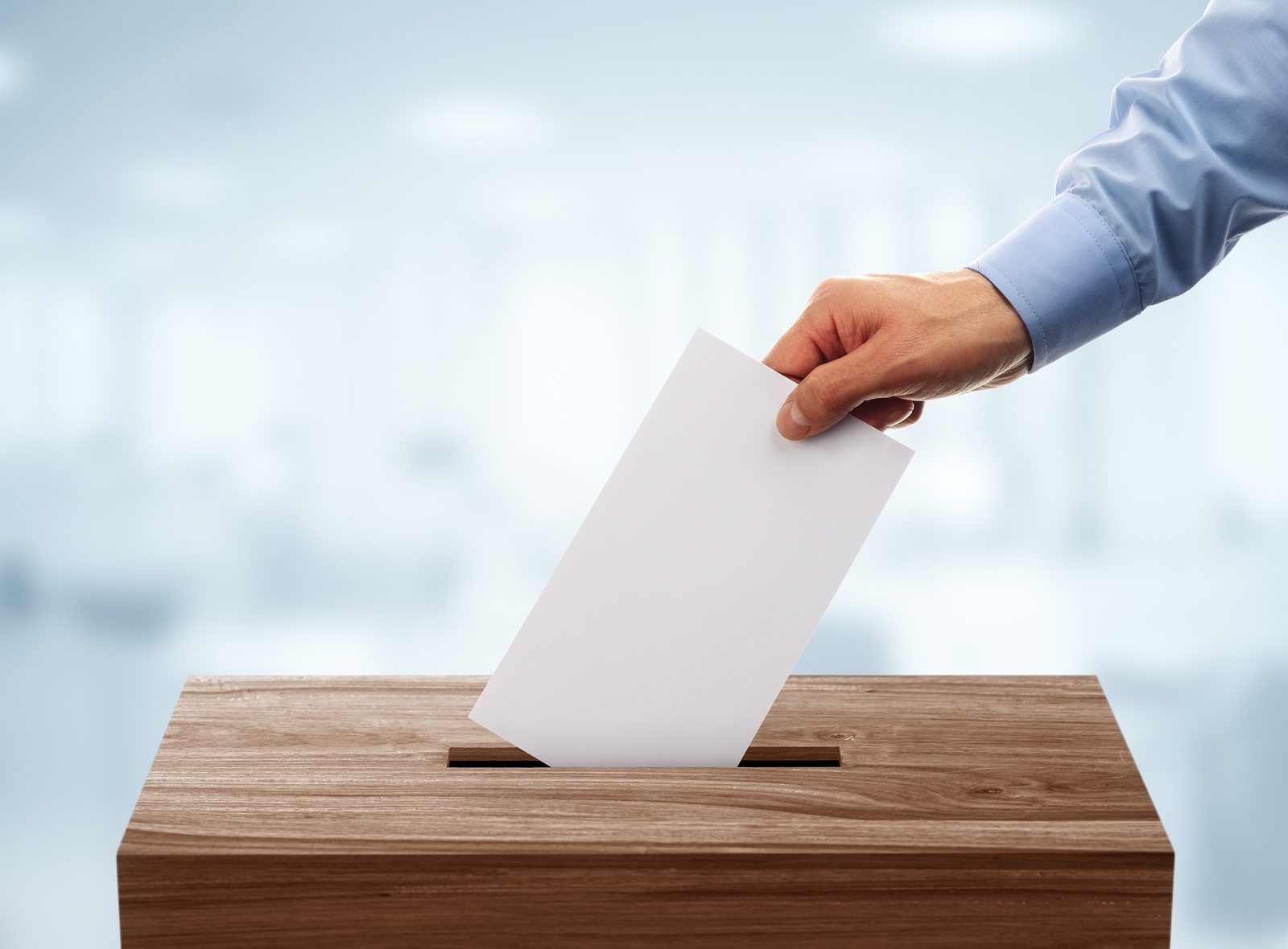 Ballot Box With Person Casting Vote On Blank Voting Slip Emerging Europe