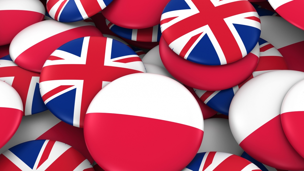 Poland and UK Badges Background - Pile of Polish and British Flag Buttons 3D Illustration