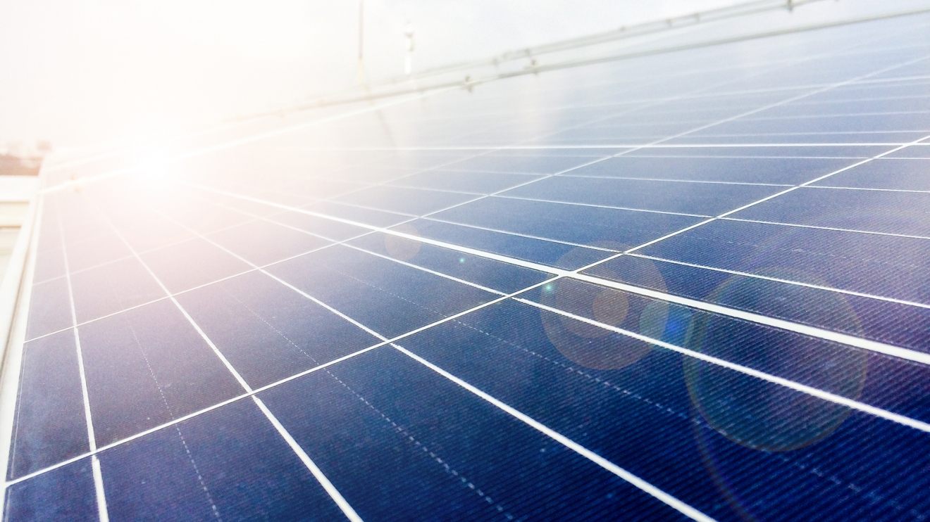 Soft focus of Solar panels or Solar cells on factory rooftop or terrace with sun light Industry in Thailand Asia. Can saving energy. Sun energy. renewable energy. Clean energy.