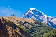 Mount Kazbek View From Stepantsminda Town In Georgia. It Is A Do