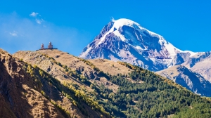 Mount Kazbek View From Stepantsminda Town In Georgia. It Is A Do
