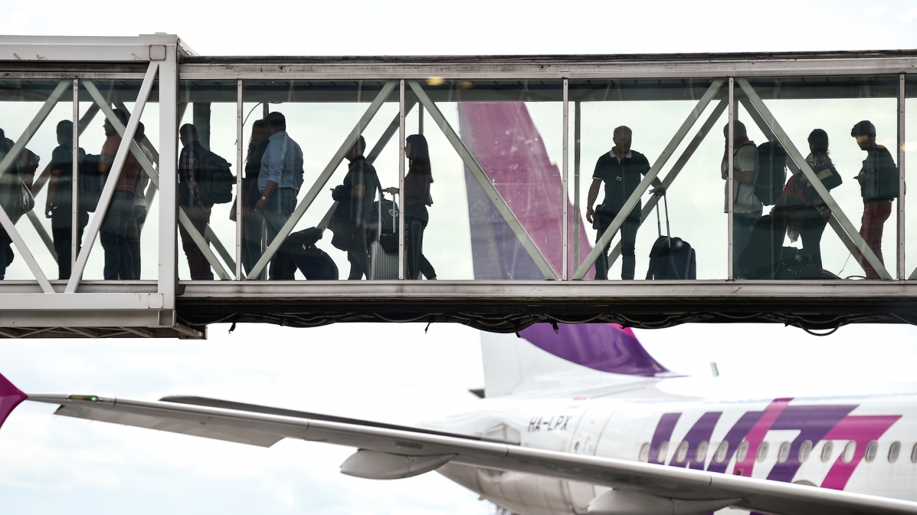 Passengers Boarding On Airplane at otopeni bucharest airport