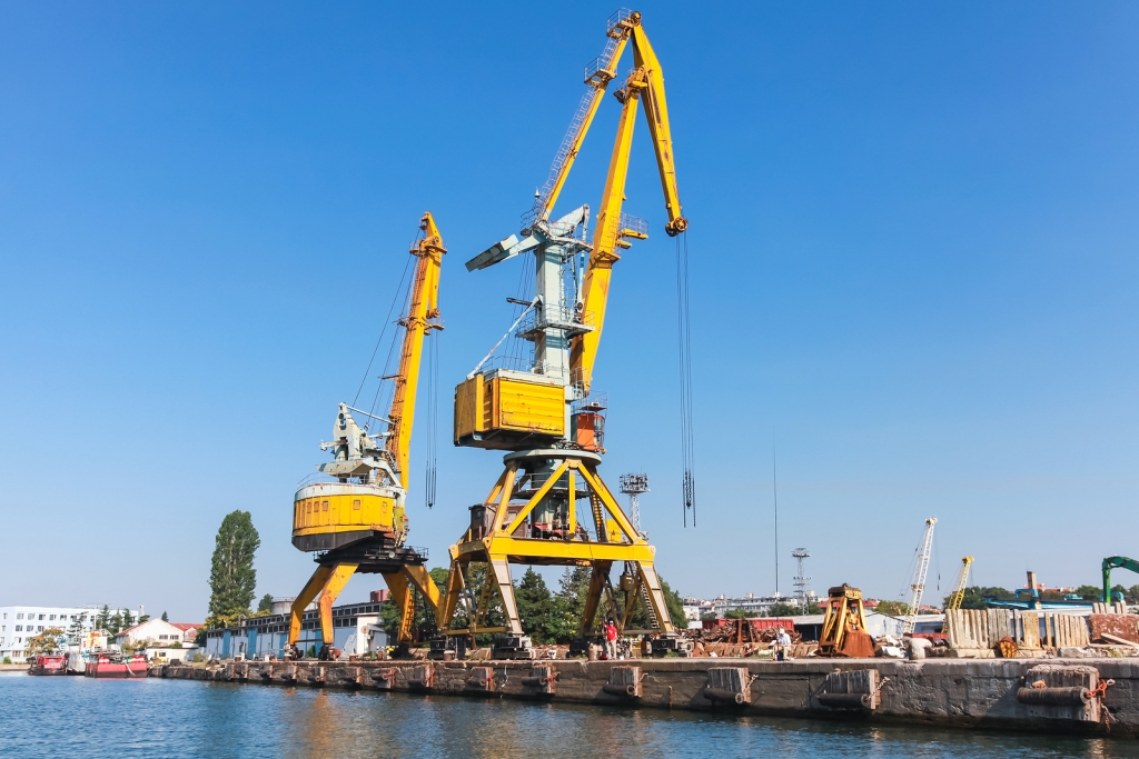 bigstock-Port-Cranes-Work-In-Cargo-Port-263246641 - Emerging Europe