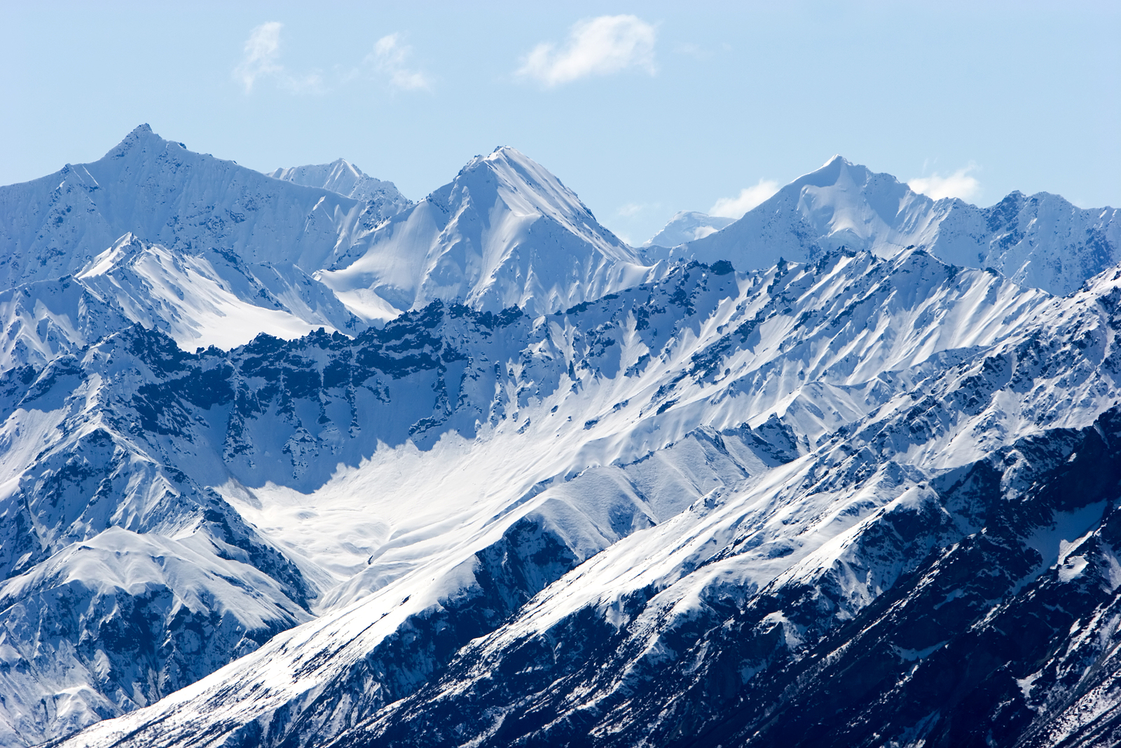 bigstock-Snowy-mountain-tops-in-Alaska-11882624