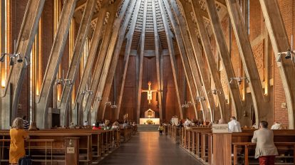 Poles pray inside a Warsaw church.