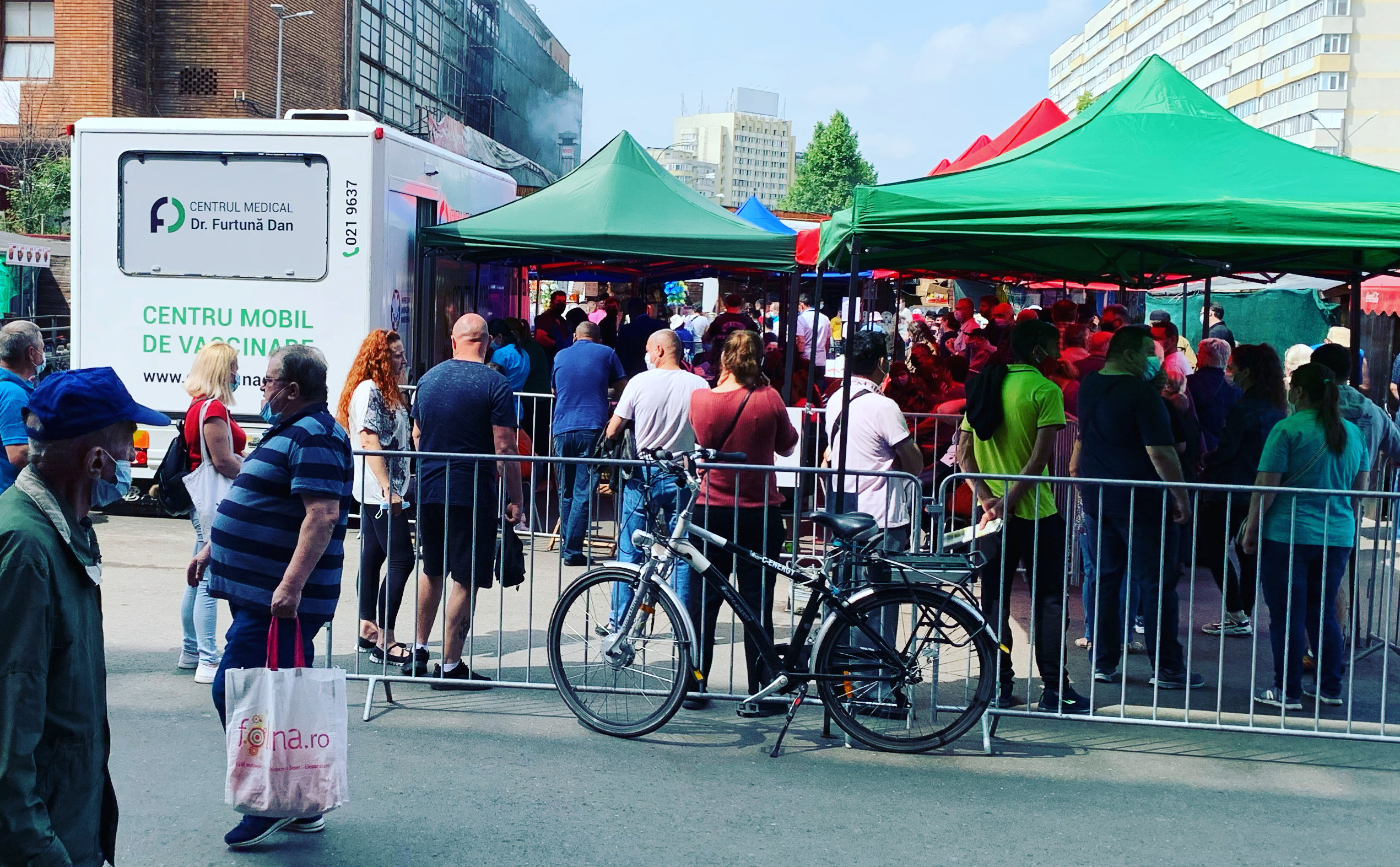 Queuing for vaccines in Bucharest's Obor market