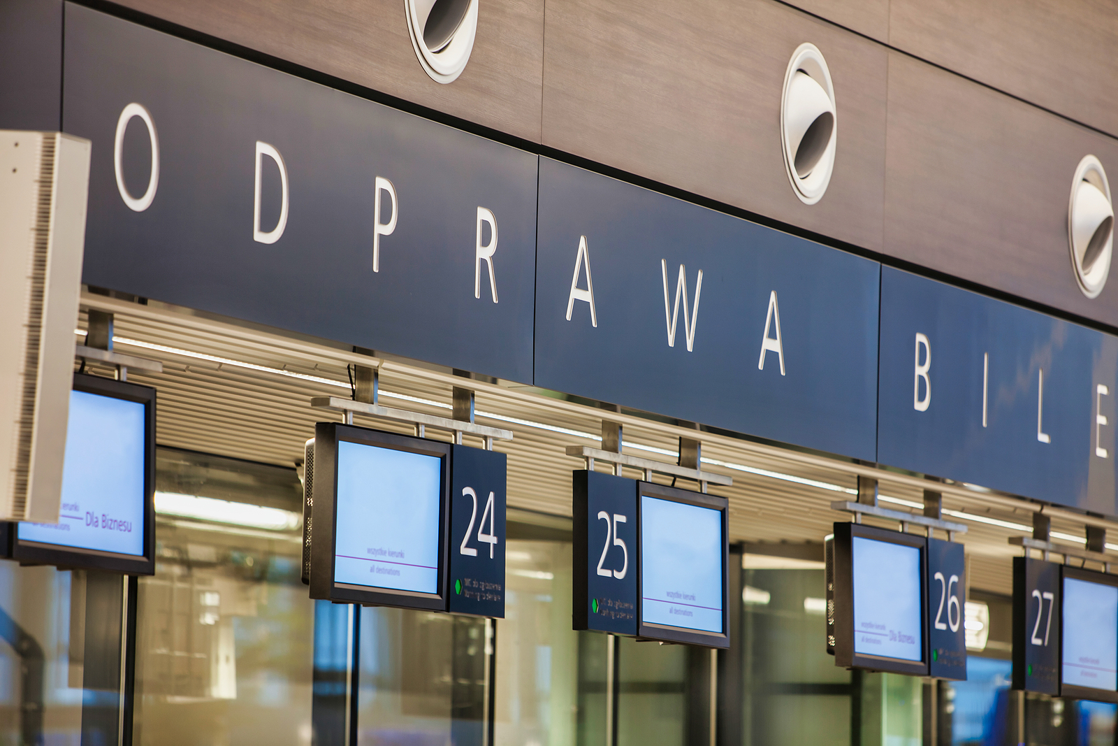 bigstock-Photo-of-airport-check-in-area-354405113