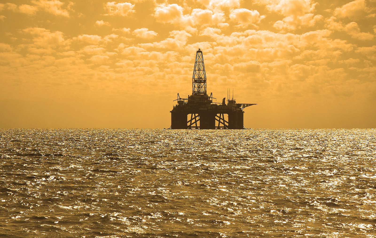 bigstock-Oil-Rig-During-Sunset-718729